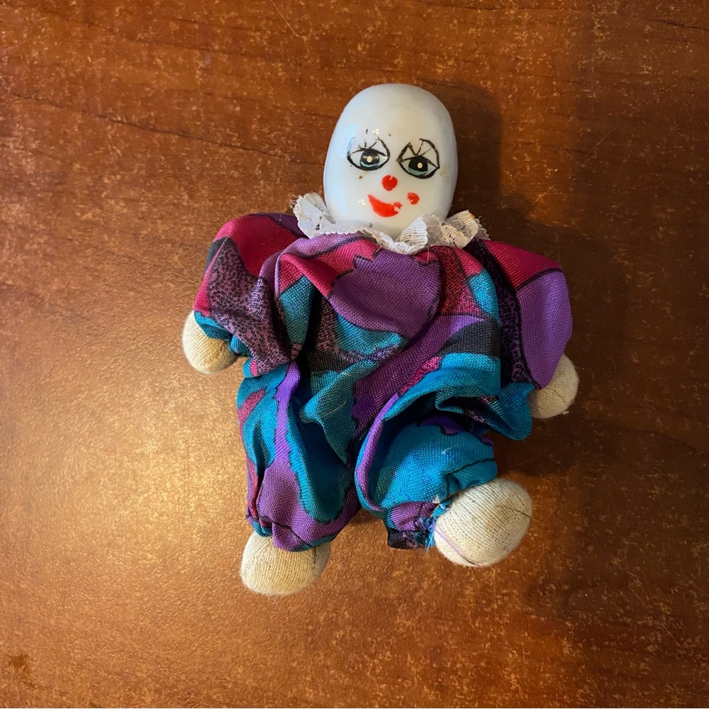 Vintage  Porcelain Painted Face Sand Filled Sitting Clown Doll 5”with Flaws